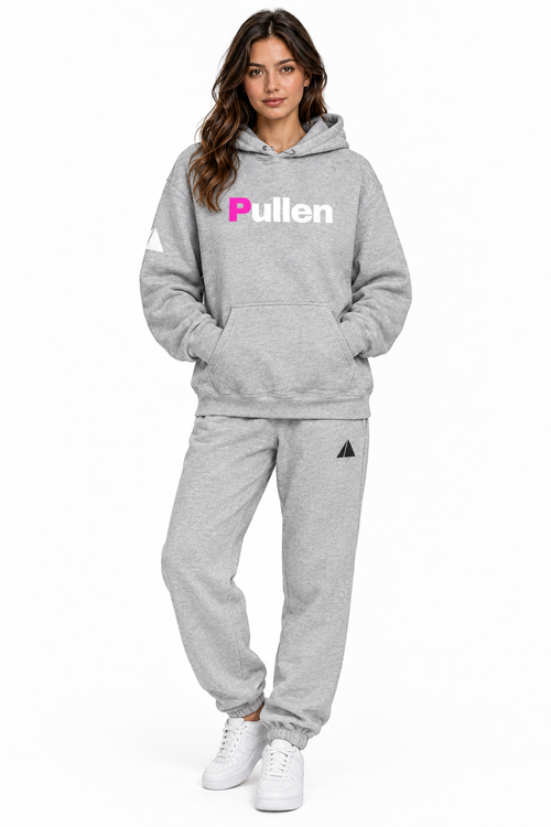 Female model wearing the grey hoodie and grey sweatpants set